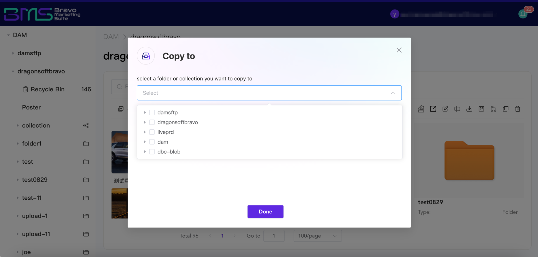 A dark-themed file management UI showing a 'Copy to' dialog with folder options and a purple 'Done' button.